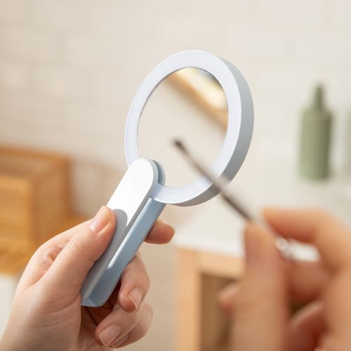 Espejo plegable con luces