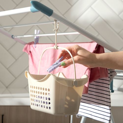 Canasto contenedor con 36 pinzas